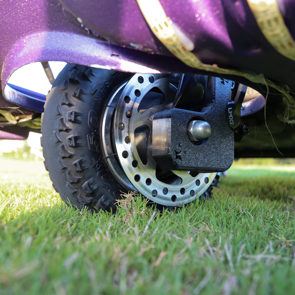 Close-up of Manji Cart disc brake system installed on crazy cart wheel.