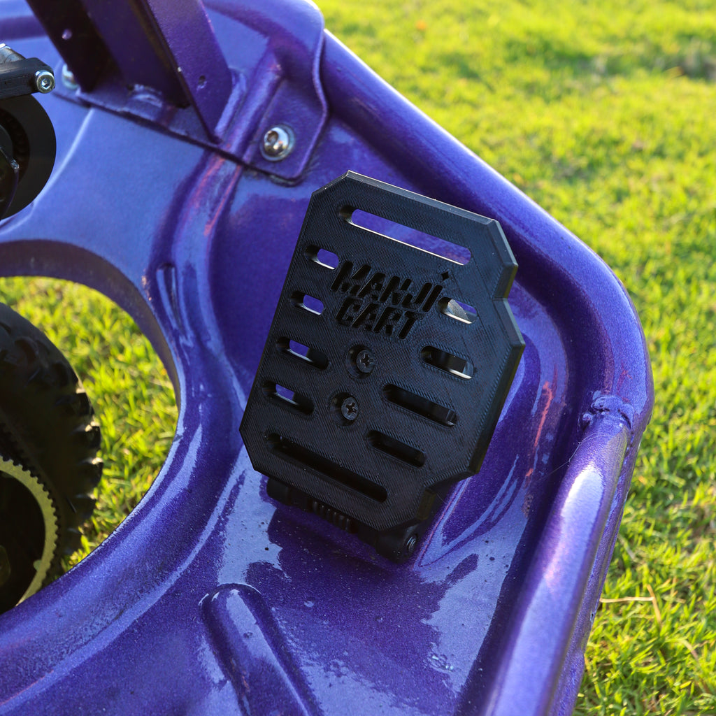 Close-up of branded Manji Cart throttle pedal installed on crazy cart.