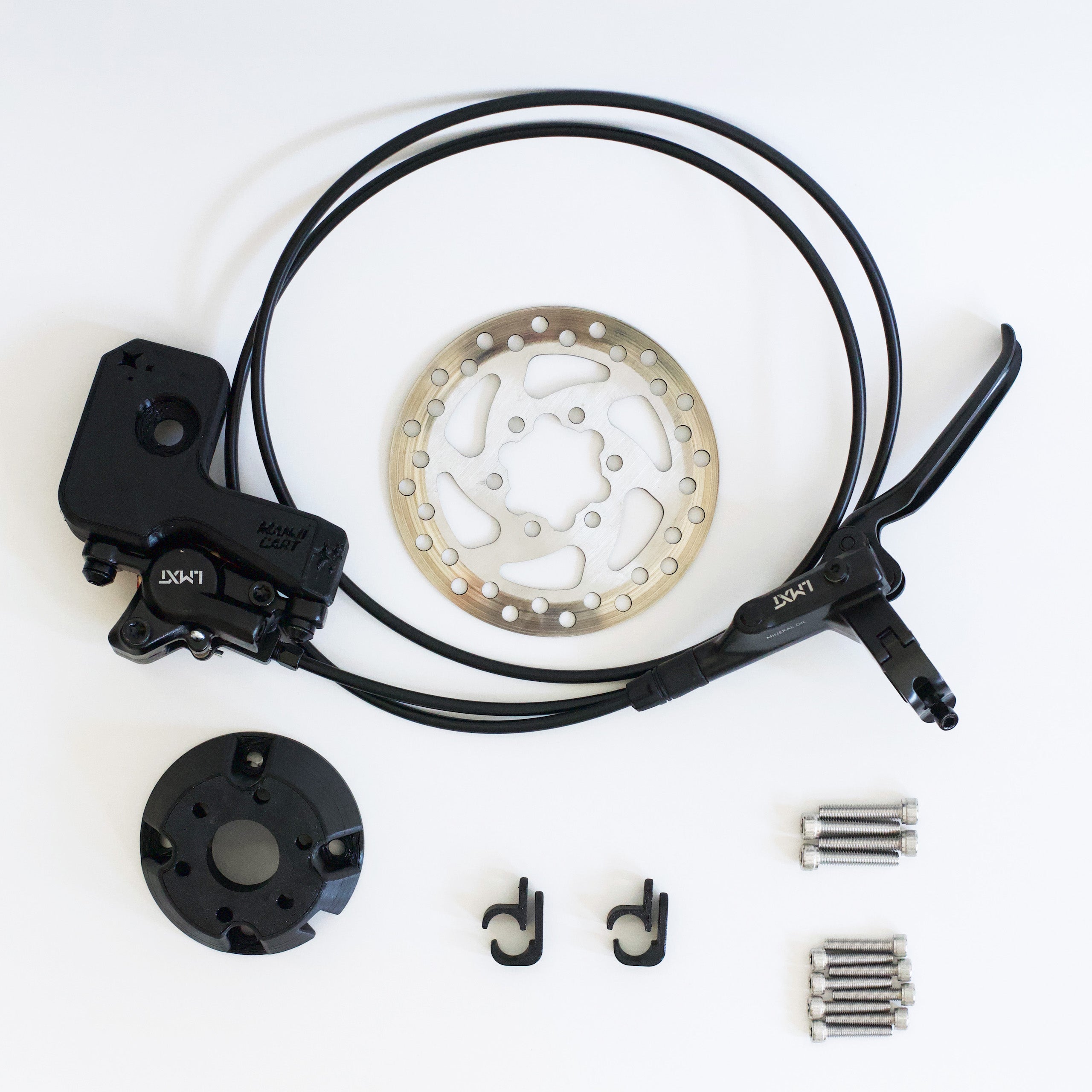 Complete brake kit parts for crazy cart. Includes caliper mount, rotor mount, hardware, brake rotor, wheel spacers, brake caliper and lever.