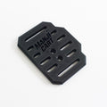 Close up side view of throttle pedal with Manji Cart branding.